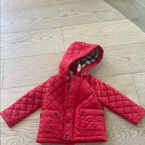Burberry Vibrant Red Hooded Puffer Jacket with Quilted Design. 2 stains pictured